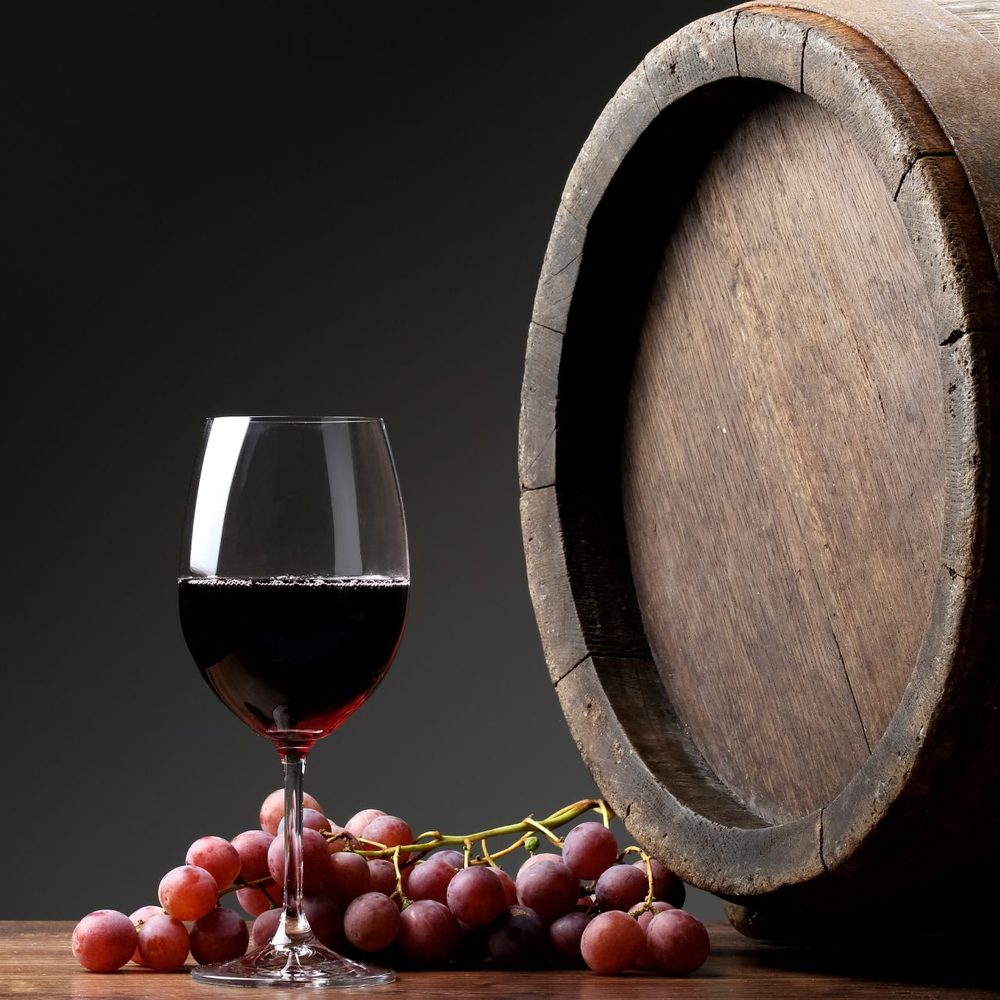 Premium Australian wine, grapes and oak barrel